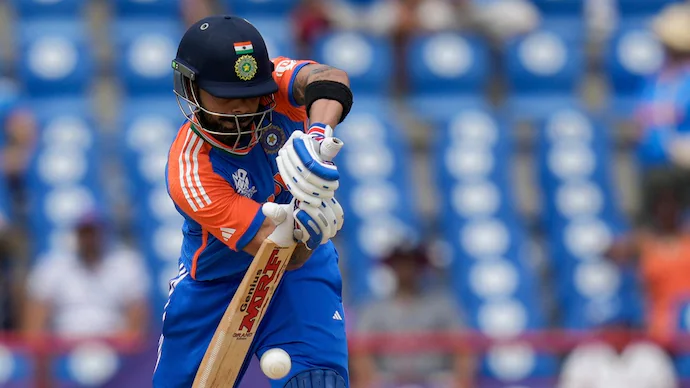 Michael Vaughan backs Virat Kohli to hit fifty in T20 WC final, expects India victory.