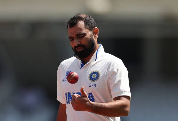 https://www.gettyimages.in/detail/news-photo/mohammed-shami-of-india-prepares-to-bowl-during-day-one-of-news-photo/1496648635?adppopup=true